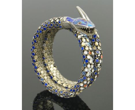 A continental silver and coloured enamel sprung serpent design bracelet,
marked 935.