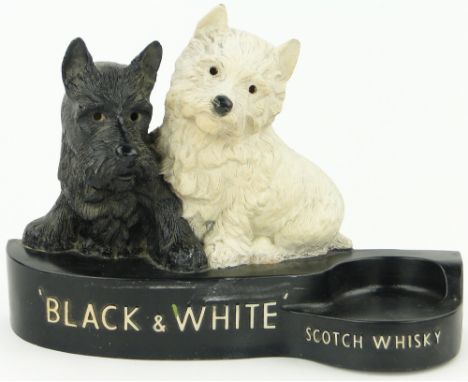 A black and white Scotch Whisky composition advertising lamp bar stand,
length 12".