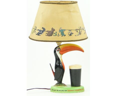 A Carltonware Guinness Toucan design table lamp,
with original shade, height incl. shade 16.5".