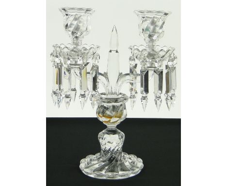 A Baccarat crystal twin branch candelabrum,
with arrow head lustre drops on spiral twist base, signed, height 12.75".