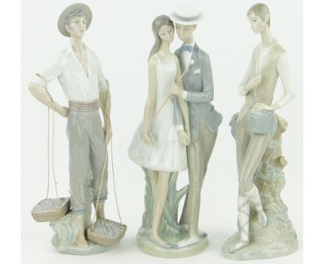 A Lladro couple,
height 15.4" and 2 other Lladro figures (3).