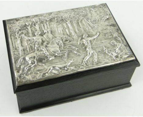 Ebonised velvet lined jewel box with white metal plaque depicting Medieval hunting scene,
length 8.75".