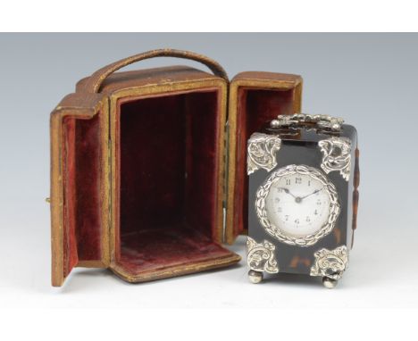 A silver mounted tortoiseshell Carriage Clock with white enamel circular dial, 4in, in leather travelling case