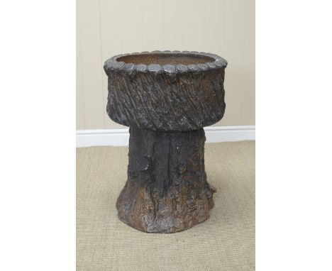 A stoneware circular Planter with bark effect on naturalistic trunk base, 19in diam
