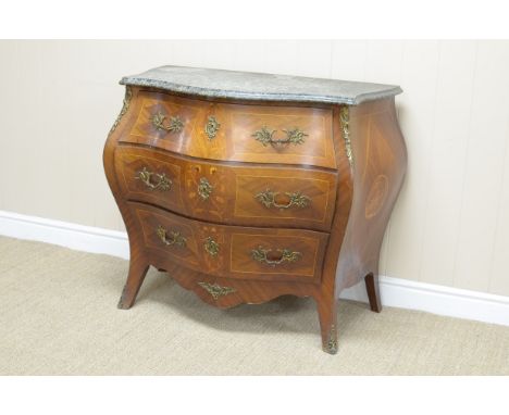 A Louis XV style marquetry Commode of bombe form with green veined marble top above three drawers having floral inlay, gilt-m