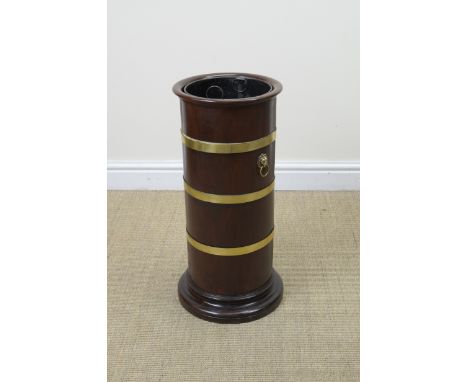 A 19th Century mahogany and brass cylindrical Stick Stand with lion mask and ring handles, 2ft H