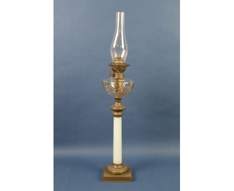 A 19th Century Oil Lamp with cut glass reservoir above white glass column mounted upon copper plinth, 2ft H (excluding funnel