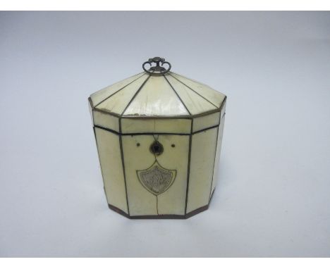 A Gerorgian ivory ten sided Tea Caddy with shield shape cartouche engraved initials, tortoiseshell frieze to base, 4 1/4 in, 