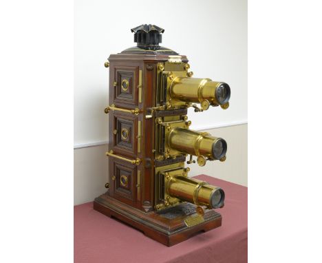 A late 19th Century mahogany and rosewood cased Triunial Magic Lantern by W.C. Hughes, Manufacturers, Mortimer Road, Kingslan