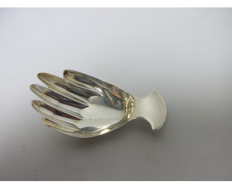 A George III silver Caddy Spoon in the form of a hand, London 1808