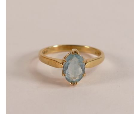 18ct gold ring set with oval light blue stone, size N,