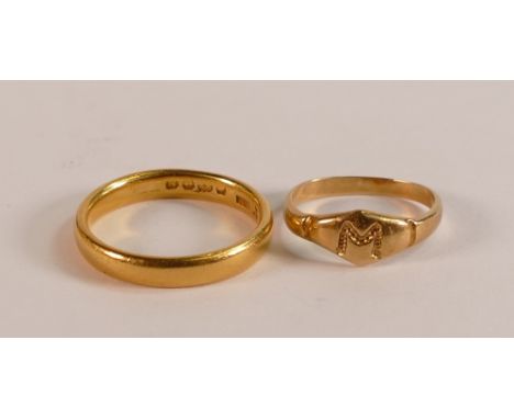 22ct gold wedding ring, size J,3.6g together with a unmarked yellow metal ring with initial M, tested to be 18ct gold or high