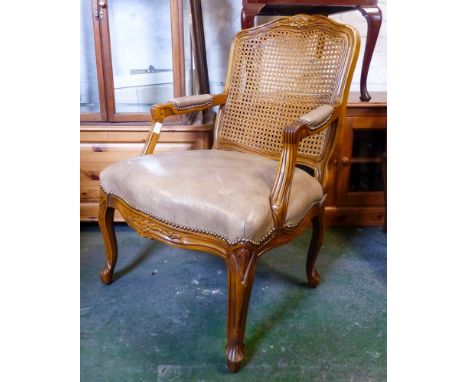 French Louis XV Style Carved Oak Bergere. Cabriole legs, leather seat and armrests.
H98cm W37cm D42cm