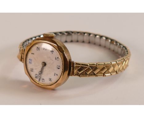 Ladies 9ct rose gold watch with gold plated expandable bracelet. 