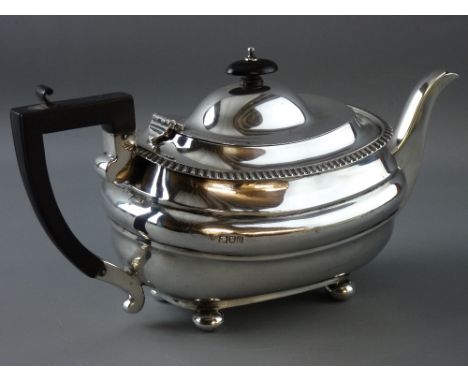 A HEAVY OVAL SILVER TEAPOT on four ball feet, 23 troy ozs gross, London 1927