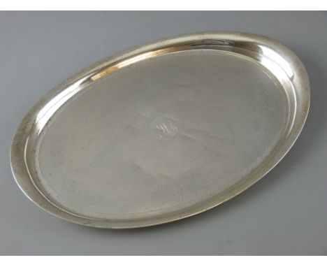 AN OVAL SILVER ENGINE TURNED TRAY with centre monogram, 13 troy ozs, Birmingham 1946