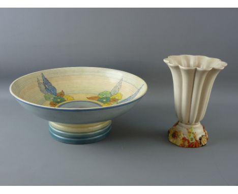 TWO ITEMS OF CLARICE CLIFF POTTERY including a large pedestal fruit bowl decorated in the 'Capri' pattern in blue, with multi