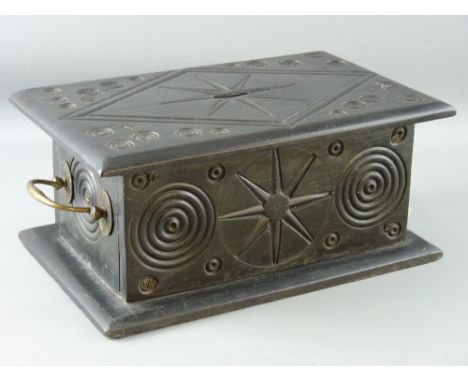 A WELSH SLATE FOLK ART piece in the form of a chapel alms box, having a central diamond and star surround to the coin apertur