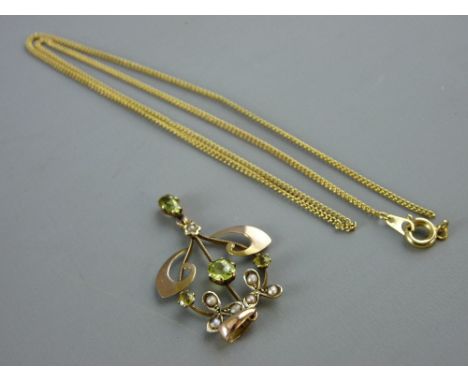 A NINE CARAT GOLD SCROLLED PENDANT with peridot and seed pearls, 1.5 grms and a yellow metal five link neck chain