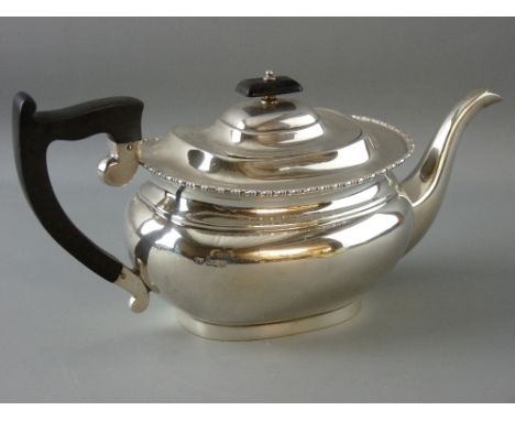 A SUBSTANTIAL OVAL SILVER TEAPOT with bead edging, composition handle and knopped lid, 25 troy ozs gross, Sheffield 1938