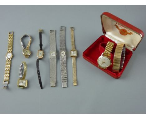 A PARCEL OF SIX UNBOXED LADY'S WATCHES, a yellow metal encased Rotary oval dial lady's watch with incorporated bracelet and a