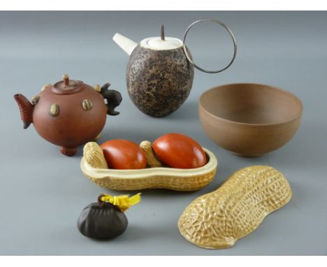 A CHINESE YIXING RED WARE TEAPOT of naturalistic form, a pot and cover with contents in the form of a monkey nut, a miniature