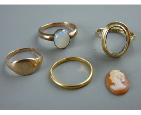 AN UNMARKED GOLD DRESS RING with small oval opal, 2.9 grms, a nine carat gold dress ring with oval cameo (loose), 3 grms, a n