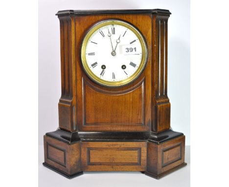 A 19th century mahogany mantle clock, H. 37cm.