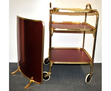 A 1960's tea trolley and matching fire screen.