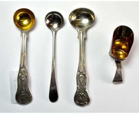 Three hallmarked silver large salt spoons and a tea caddy spoon.