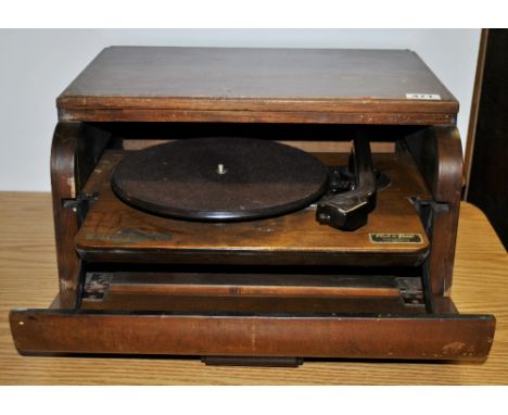 An interesting 1940's Plus-a-gram record player.