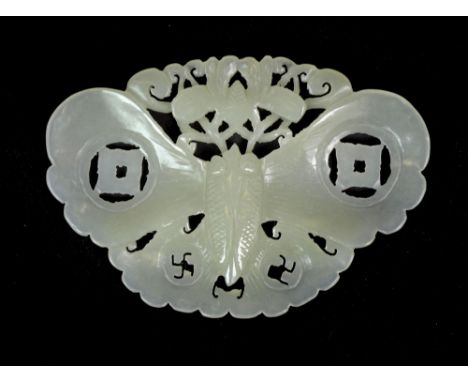 A carved Chinese jade amulet of a butterfly, W. 7cm.