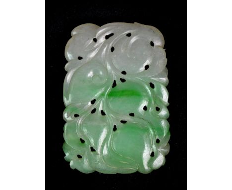 A Chinese mixed colour jade peach amulet, 5.5 x 4cm.