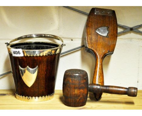 An oak and silver plate bucket, a lemon squeezer and nut hammer.