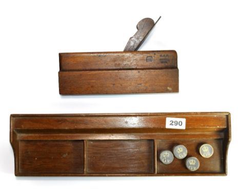 An RAF moulding plane, a desk stand and 4 map weights.