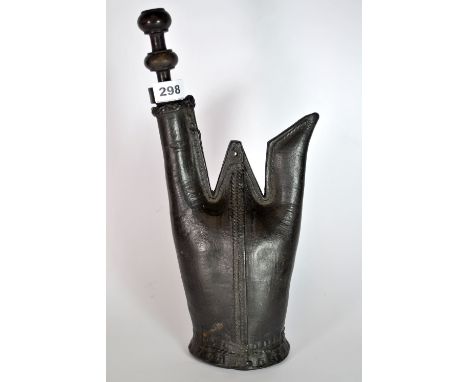 A 16th century Turkish Ottoman military leather water flask (Matara) formed from the hind quarters leather of an animal with 