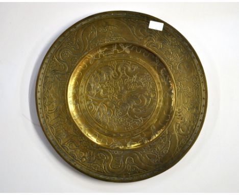 A large mid 20th century Chinese engraved bronze charger, Dia. 47cm.