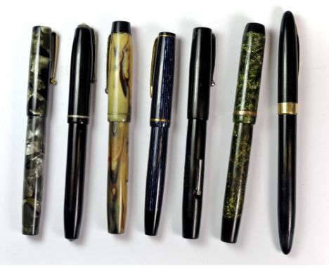 Seven vintage fountain pens.