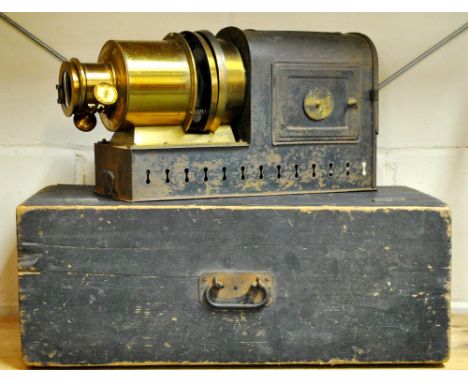A cased Victorian lantern slide projector.