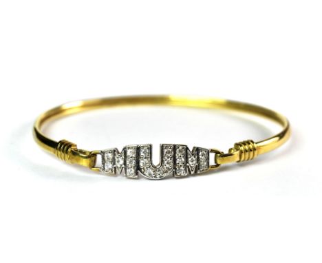 A 9ct gold stone set "Mum" bangle.