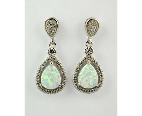 A pair of 925 silver and faux opal drop earrings.