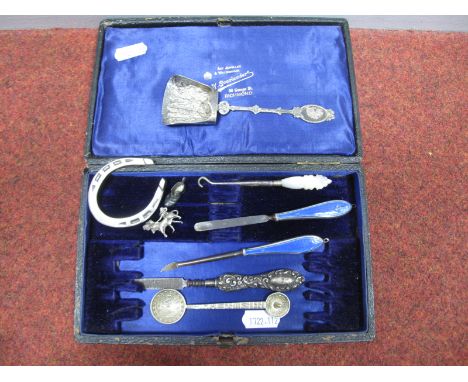 A Miniature Hallmarked Silver Horseshoe, HH, Sheffield 1945 (32grams); together with enamel handled manicure implements (dama