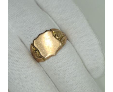 A Chester Hallmarked 9ct Gold Signet Ring, with vacant panel, between ornate textured shoulders (finger size P) (3grams).