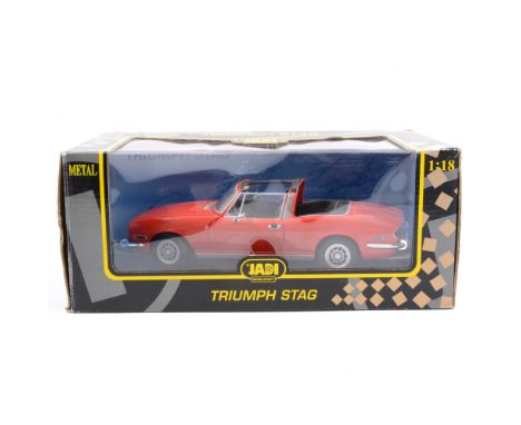 Jadi Modelcraft 1:18 scale Triumph Stag, red body with open-top roof, boxed.