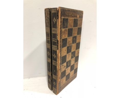 Leather covered games box with chess and backgammon pieces, along with another folding chess board with inlay stringing edge,