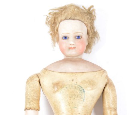 French bisque head fashion doll, with fixed blue glass eyes, kid leather body and bisque arms, has a maker stamp on the chest