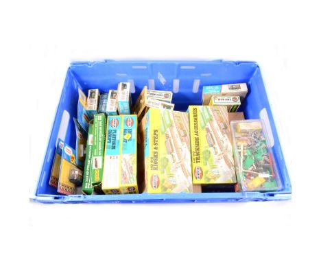 Model railways track-side plastic model kits by Airfix and others, along with accessories for train track layouts, figures of