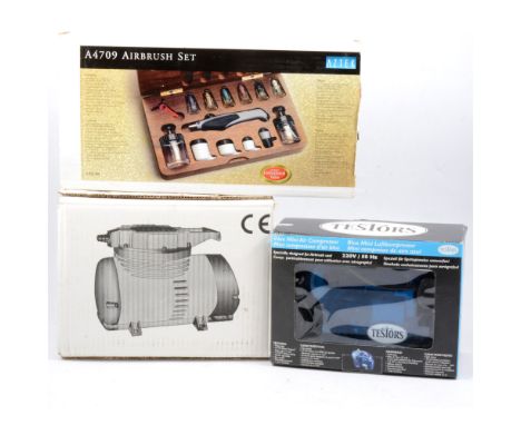TUV Products MINI MAC air compressor, with manual and box, showing just little use, a Testors blue mini air compressor boxed,