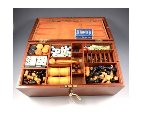 Games compendium, with draughts, backgammon, dominoes, chess pieces and board, lead horse figures, etc, 34cm wide, 20cm deep,