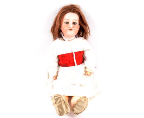 Armand Marseille Germany bisque head doll, 390 A.8.M stamp, fixed eyes and open mouth, composition limbs and body, 61cm tall.